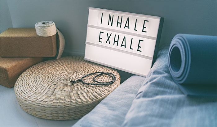 sign with inhale and exhale text